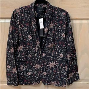Black lined jacket with floral pattern